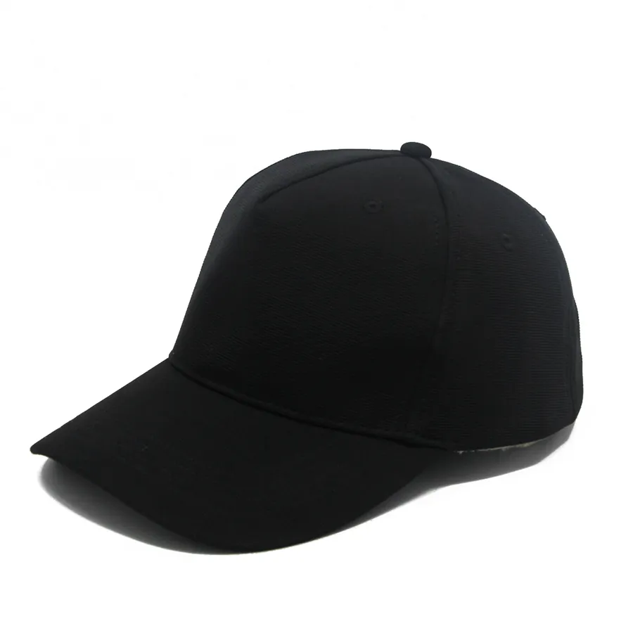 Three-quarter view of a plain black cap showing a front area and a seam running toward its side.