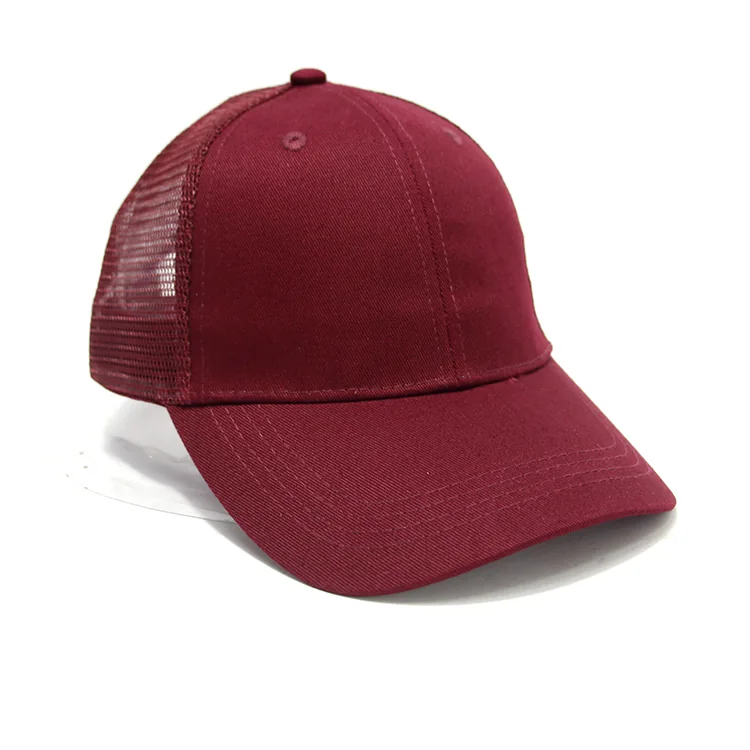 Burgundy curved-brim cap with a plain front, mesh-looking side panel, visible crown seams and brim stitching.