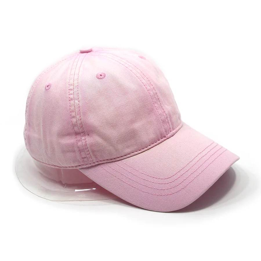 Three-quarter view of a pink baseball cap with a curved brim, visible panel seams and eyelets.