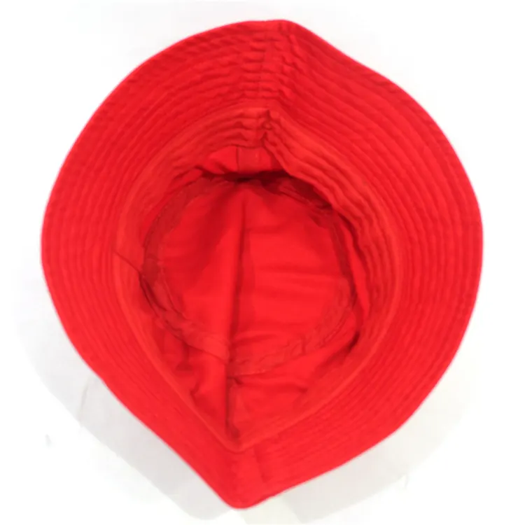 Inside view of a red bucket hat showing the crown opening, underside of the brim and concentric stitch rows.