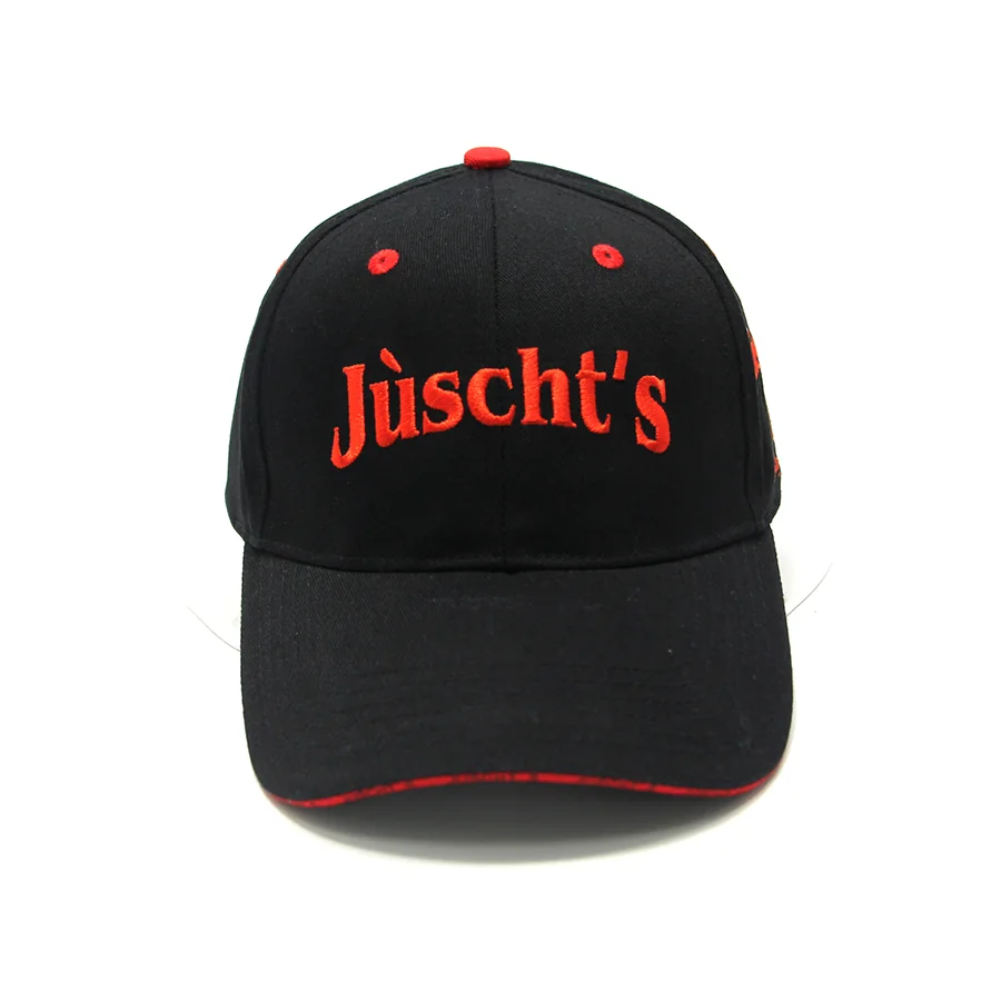 Black baseball cap with red word embroidery, red eyelets and red brim piping.