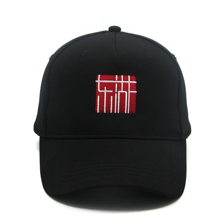 Front view of a black baseball cap with a red and white square embroidered emblem.