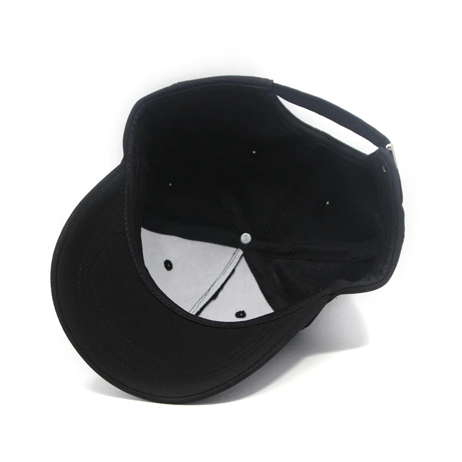 Interior of the black baseball cap showing the light front-panel lining, black seam tape and sweatband.