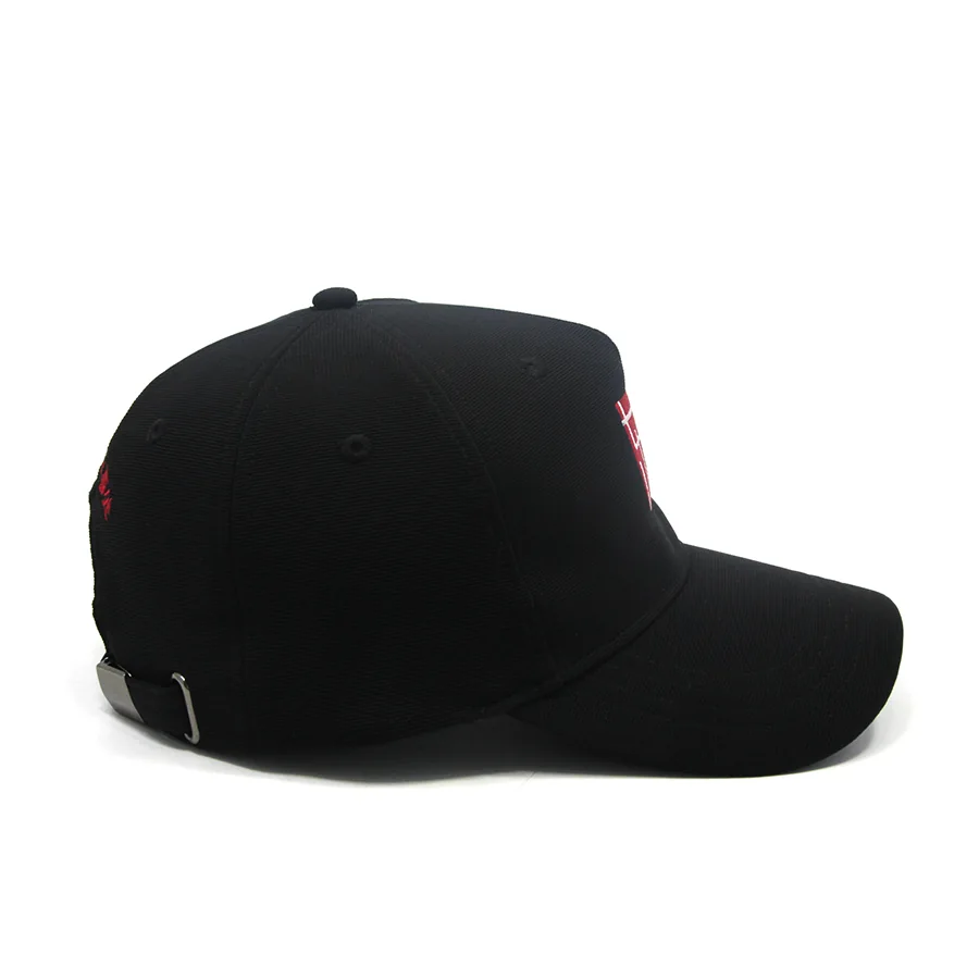 Side view of the black embroidered baseball cap, showing its curved brim and adjustable back strap.