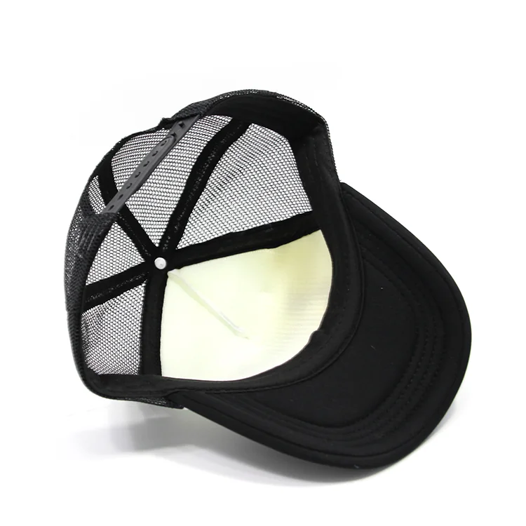 Interior of the trucker cap showing the light front-panel backing, black mesh, seam tape and sweatband.
